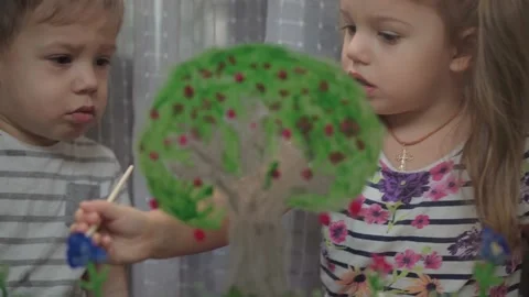 Childhood, creativity, nature, spring, summer concept - close-up of two little Stock Footage 145698144