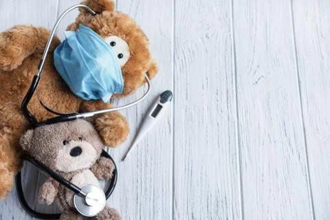 Childhood diseases. Danger of diseases for children. Teddy bears with a Stock Photos