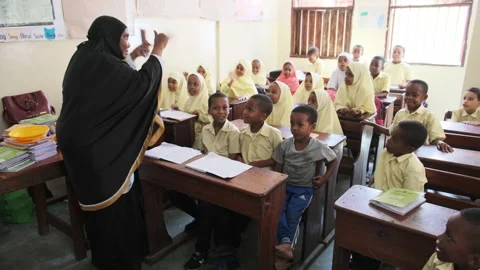 Children in an African Elementary School Sit at Desks in a Classroom, Zanzibar Video stock 150262210