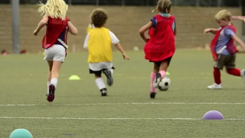 Children ages 5-7 playing soccer/ football. Stock Footage 71352815