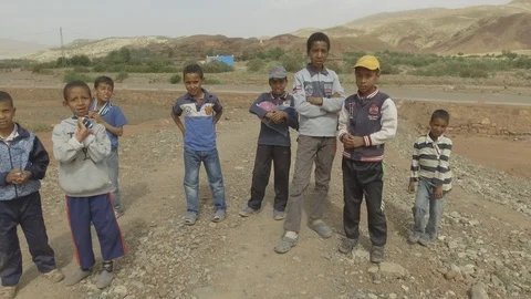 Children in Ait Benhaddou looking at the camera, Morocco, Africa in 4K Stock Footage 91831488