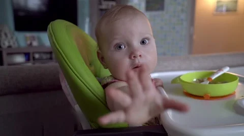 Children and nutrition, mother feeding baby girl Stock Footage