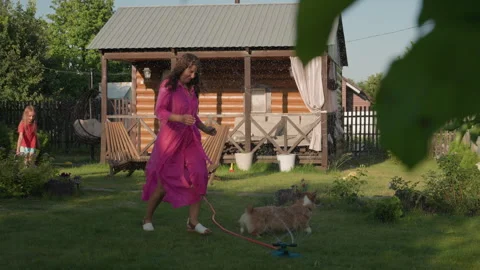 Children And Pet Having Fun Outside, Adults And Kids Delight In Active Outdoor Stock Footage 330897620