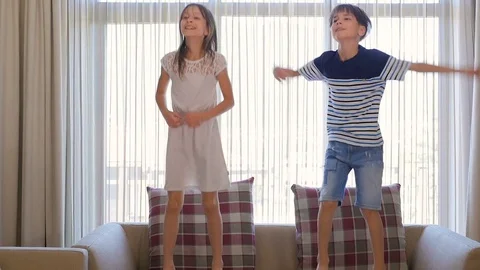 The children are having fun. The boy and the girl are having fun.  Stock Footage 80314046