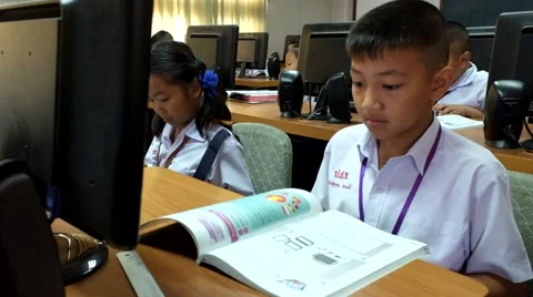 Children are learning computer Thailand Stock Footage 47128406