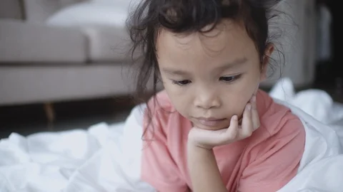 Children are learning by themselves through online media. Stock Footage 111704426