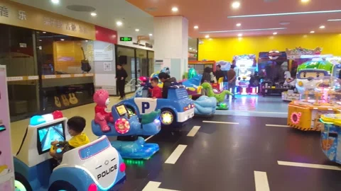 Children are playing with electronic toy cars Stock Footage 297553208