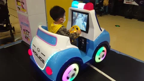 Children are playing with electronic toy cars Stock Footage 297556899