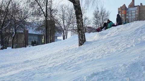 Children are playing on the ice run Stock Footage 71204482