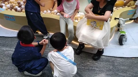 The children are playing with small balls Stock Footage 287112441