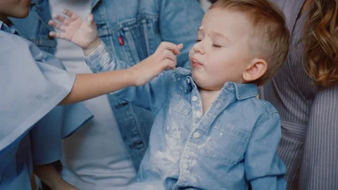 Children are playing while their parents cook and prepare for New Year. Stock Footage 120398550