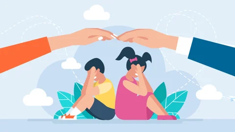 Children are sitting with their backs to each other. Two hands cover the sky. Stock Footage 173377165