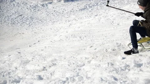 Children are sledding up and down. Stock Footage 45997582