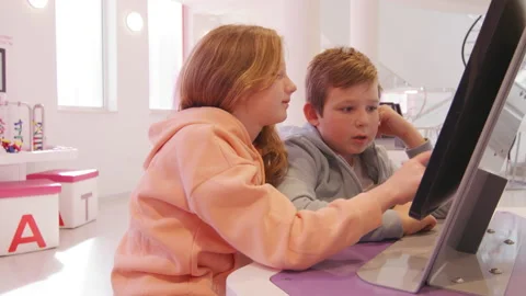 Children are studying at new computer at school Stock Footage 236359974