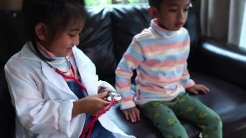 The children are taking on the role of doctors treating the sick. 스톡 동영상 221701699