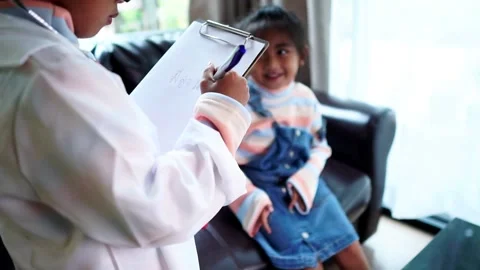 The children are taking on the role of doctors treating the sick. Stock Footage 221702345