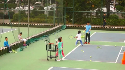 The children are training to play tennis Stock Footage 71283953