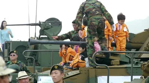 Children on army tank Video stock 8926181