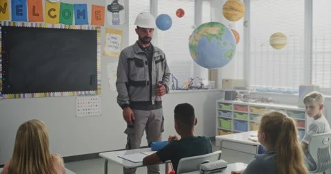 Children Asking Questions, Listening to Engineer During Career Education Lesson Stock Footage 316048060