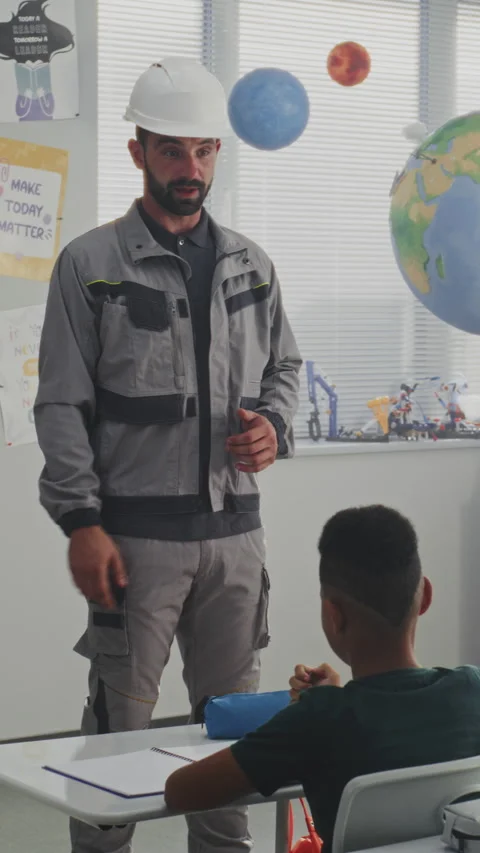 Children Asking Questions, Listening to Engineer During Career Education Lesson Stock Footage 316063939