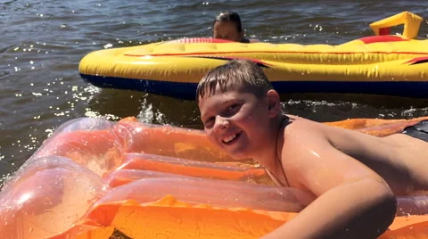 Children bathe in the river Stock Footage 66341055