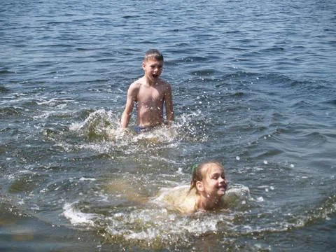 Children bathe in the river Stock Photos