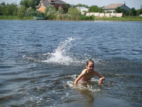 Children bathe in the river Stock Photos