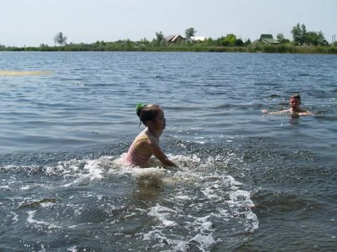 Children bathe in the river Stock Photos