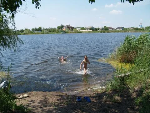 Children bathe in the river Stock Photos