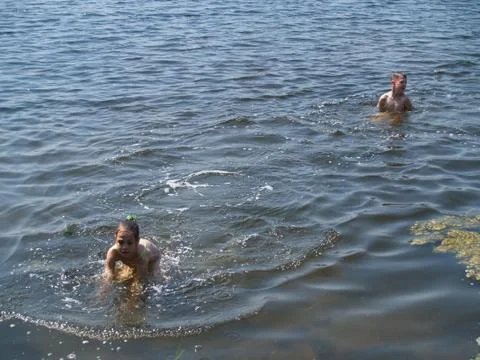 Children bathe in the river Photos