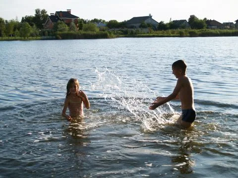 Children bathe in the river Stock Photos