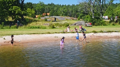 Children bathing in lake Stock Footage 97223398