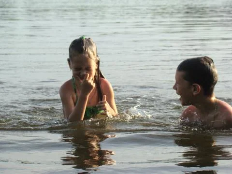 Children bathing in the river Stock Photos