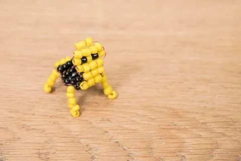 Children beadwork on the table Stock Photos