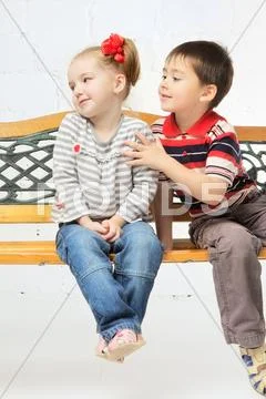 Children on bench Stock Photos