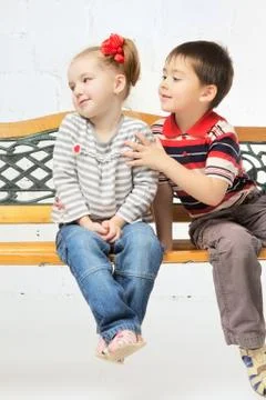 Children on bench Foto stock