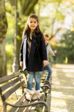 Children on the bench Stock Photos