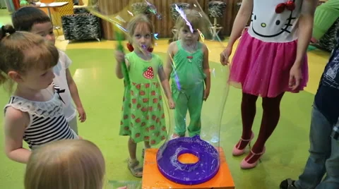 Children blow bubbles Stock Footage 44717532