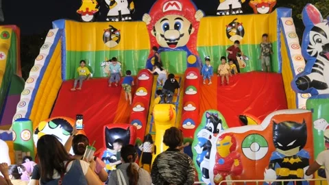 Children in bouncy castle Stock Footage 259161279
