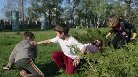 children fighting on playground