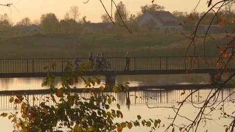 Children on a bridge at sunset Video stock 71655006