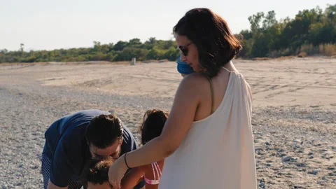 Children Bringing All Their Games To The Beach Stock Footage 280253701