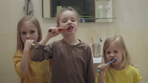 Children brush their teeth Stock Footage 153376219