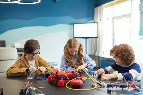 Children Building Robots in School Stock Photos