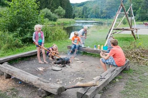 Children at the campfire Stock Photos