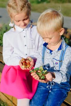 Children with candy in their hands Fotos de archivo