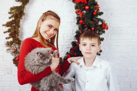 Children with cat Stock Photos