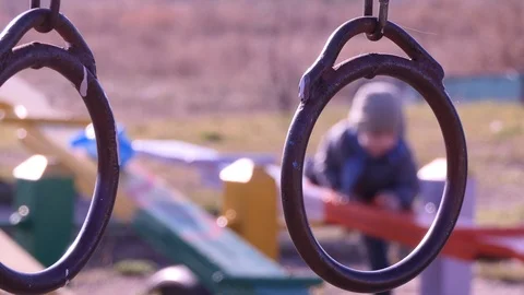 Children. A child plays with a swing. Video stock 118248341