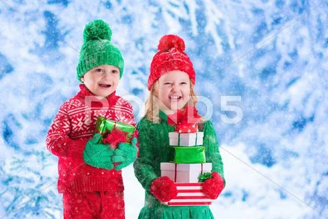 Children with Christmas presents Stock Photos