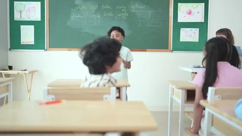 Children with classroom presentation activities in front of the classroom Stock Footage 282881066